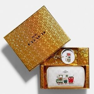 Small Boxy Cosmetic Case And Mirror Bag Charm In Signature Canvas With Train